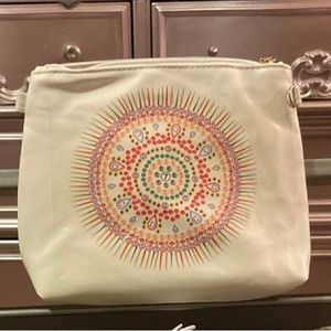 Diamond Crafts purse kit. A lot like cross stitching. You follow a pattern